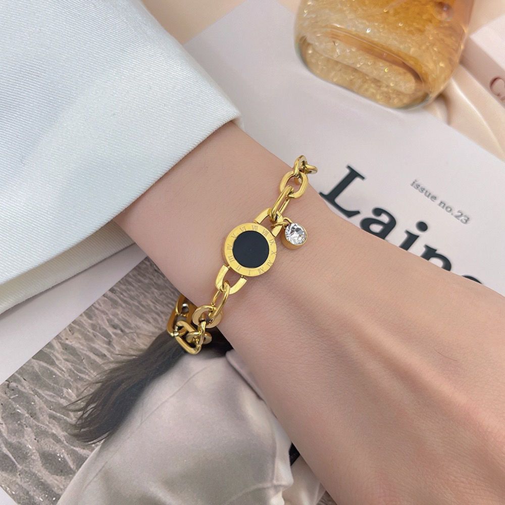 Golden Aura Bracelet with Black Enamel Disc