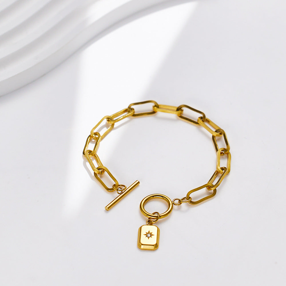 Golden Toggle Clasp Bracelet with Crystal Charm